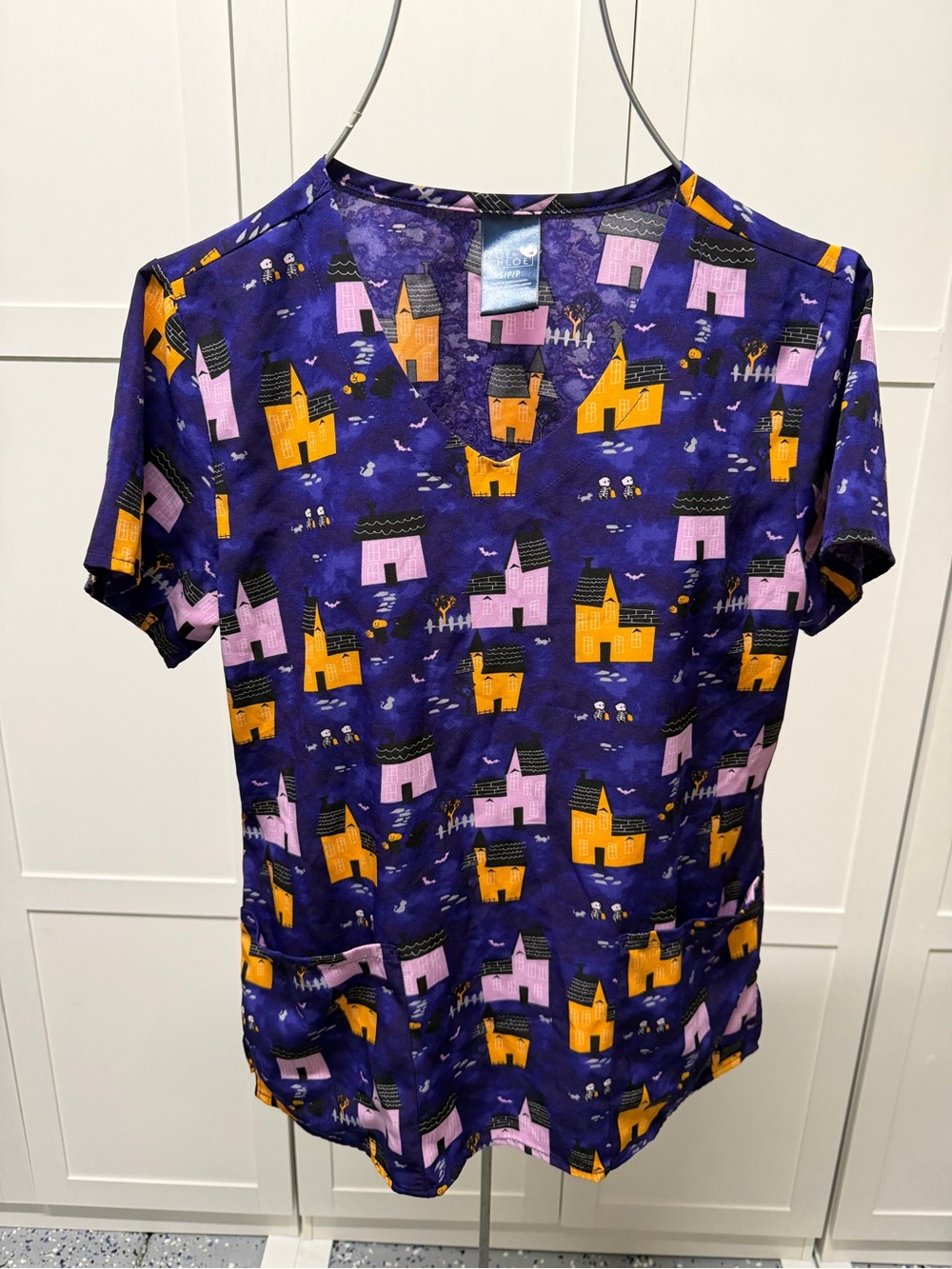Women's Purple Halloween House Print Scrub Top - Short Sleeve